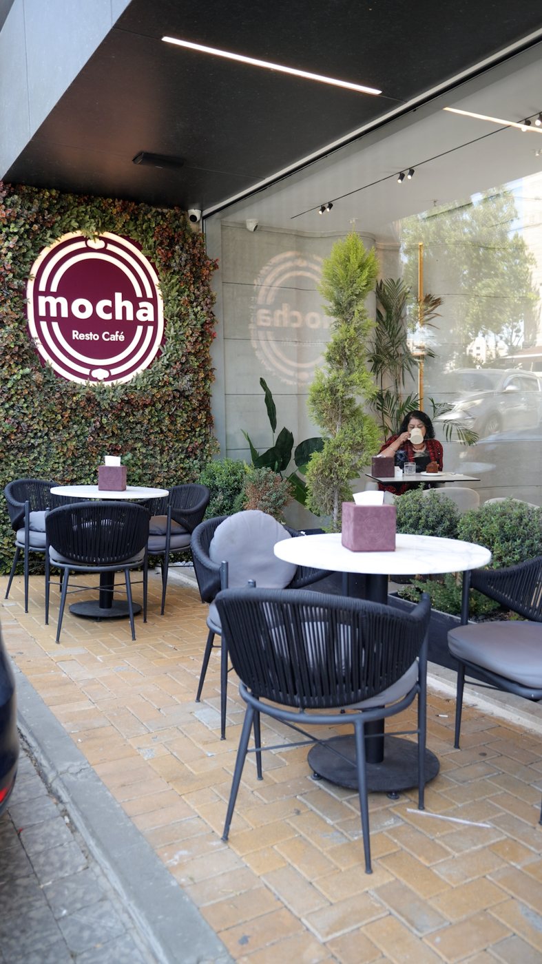 Terrace with Mocha greenery logo wall